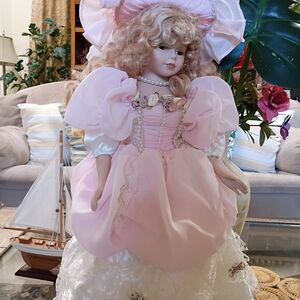 Charming Pink Doll with White Lace Dress